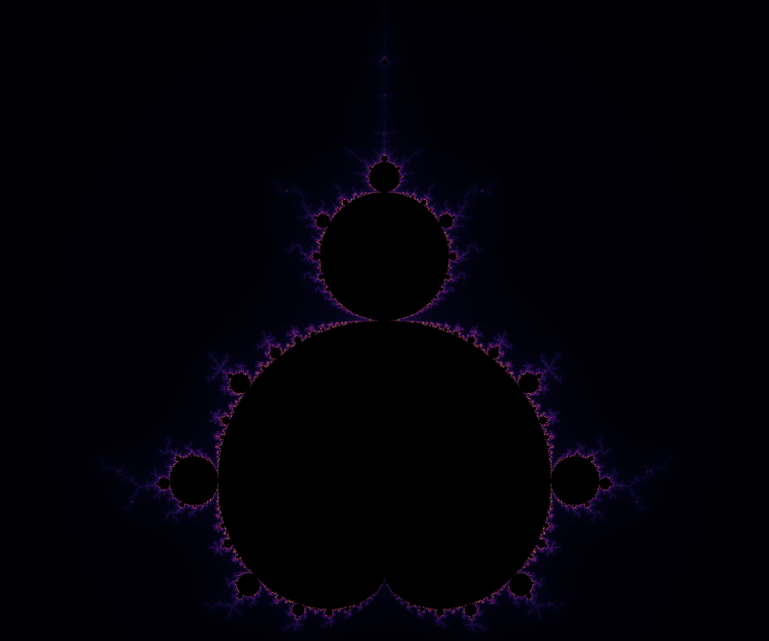 The Mandelbrot set rendered with the inferno colormap: dark background with bright orange and yellow escape bands.